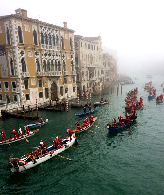 Santas on Gondola parade,Venice