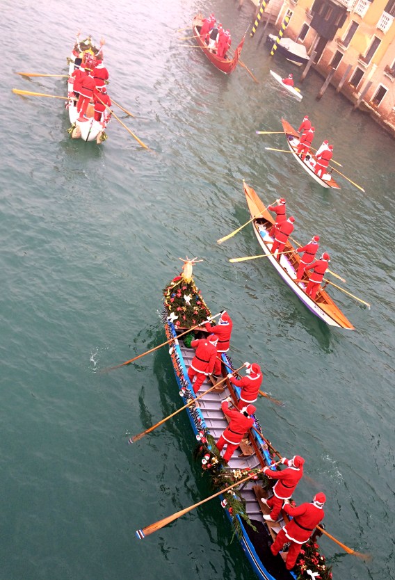 Santas on Gondola parade,Venice